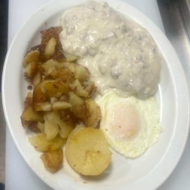 Sausage & Gravy Over Biscuit.
